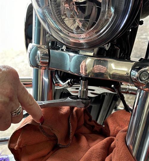 Tightening Mounting Bracket to Lower Fork Bracket